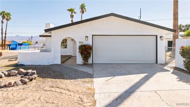 Single story home featuring stucco siding and fenc
