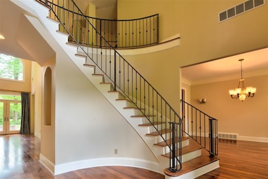 Two Story Entry with Gorgeous American Cherry Floo