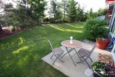 7719 Sofia Dr SW unit 14, Byron Center, MI 49315 - photo 2