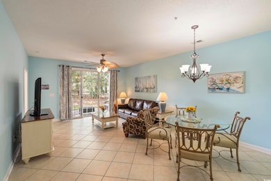 Dining room featuring visible vents, ceiling fan w