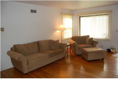Living Room with Large Picture Window looking out 