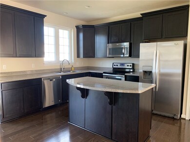 Kitchen with stainless steel appliances and granit
