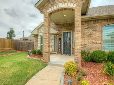 Doorway to property with a yard