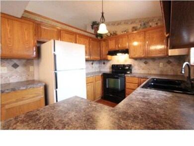 Remodeled kitchen with new tile, sink, fixtures, l