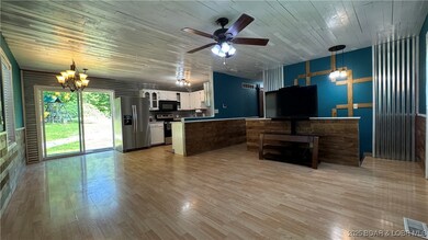 Open concept living room, dining room, kitchen