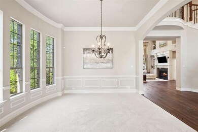 Unfurnished dining area featuring crown molding, a