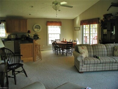 Great room with vaulted ceilings..Walk-out onto th