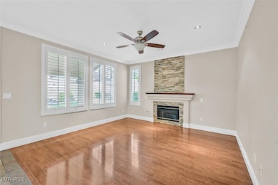 Unfurnished living room featuring ornamental moldi