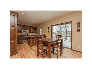 Kitchen. Beautiful contrasting hardwood floors!