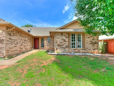 Single story home featuring a front yard
