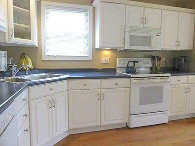 Kitchen. Lots of cabinet & counter space plus Elec