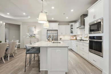 Kitchen with island and pendant lighting