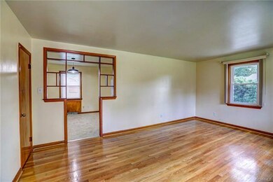 Living room toward eat-in kitchen.