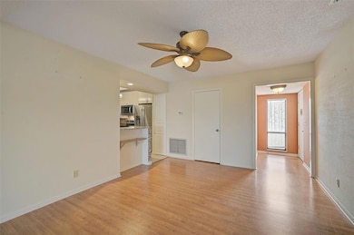 Dining Room to Front Door and Kitchen