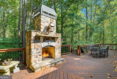 Real rock wood burning fireplace on the back deck