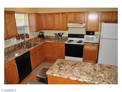 Kitchen - Brazilian granite, hardwood floors, open