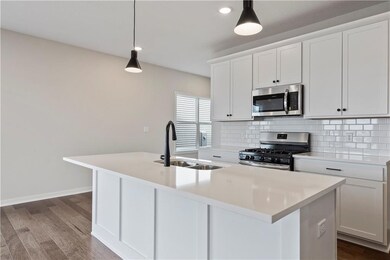 511 Hampstead Dr, Raymore, MO 64083 - photo 7