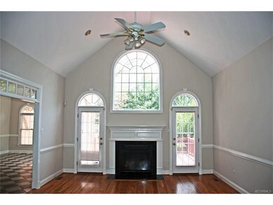 Bright and airy Living Room with cathedral ceiling