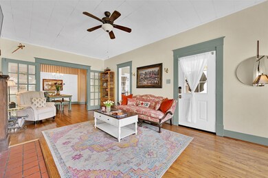 Stunning hardwood flooring is found throughout. Th