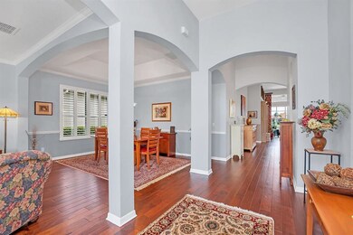 Foyer leading to combination formal living/ dining