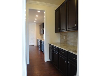 Butler Pantry between Dining Room and Kitchen