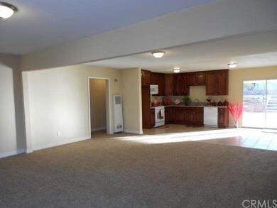 Very large living room flows into kitchen