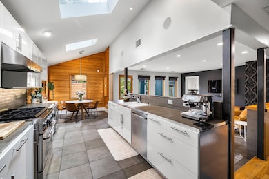 Kitchen featuring stainless steel appliances, a s