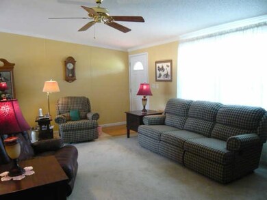 Large living room with tall ceiling