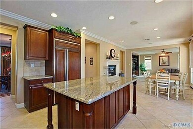 Kitchen opens to eating area and family room.