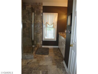 Master Bath - Updated master bath with travertine tile, granite and 5 X5  shower