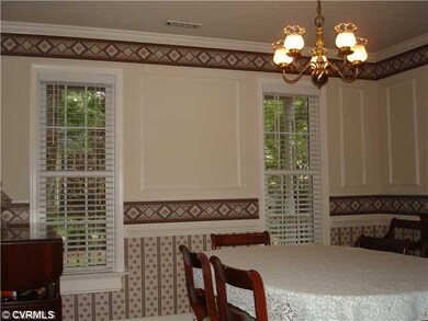 Dining Room - Hardwood floors, crown molding, pict