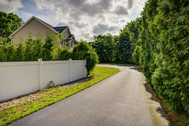 Long, private driveway to house