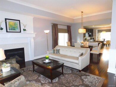 Living Room overlooking Formal Dining Room and Kit