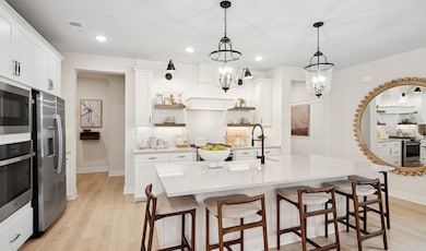 Kitchen with white cabinets