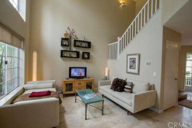 Vaulted ceilings and plenty of windows make this l