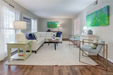 Living room with hardwood floors.