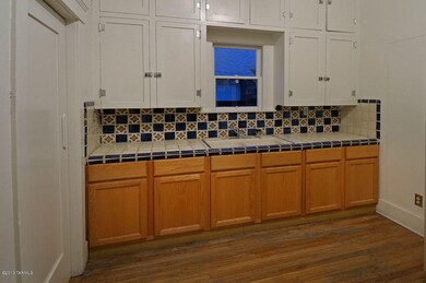 Original cabinets and pine floors