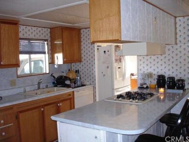 View of the kitchen and bar.  