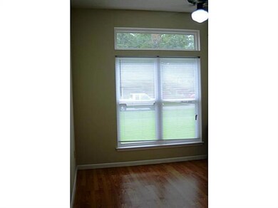 Bedroom. High ceiling w/ large closet .
