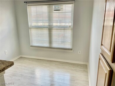 Empty room featuring light hardwood / wood-style f