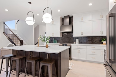 Welcome to The Hickory, where sophistication meets functionality in an open-concept layout marrying the kitchen, dining, and great room adorned with gleaming hardwood floors.