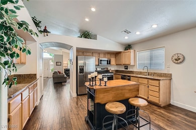 Kitchen with stainless steel appliances, light bro