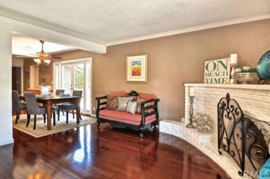 Open Floor Plan with hardwood flooring and cozy fi