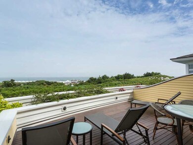 Exterior Front. Outdoor terrace overlooks East Bea