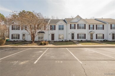 View of front of home featuring assigned owner's p