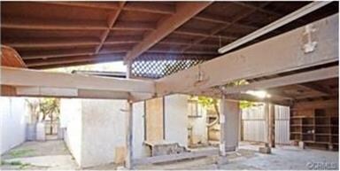 Spacious carport, alley access.