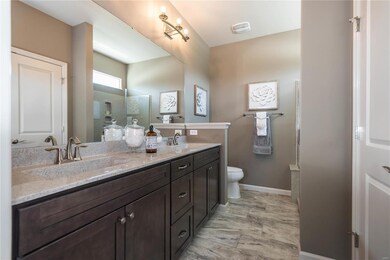 Photo representation of a similar home.  Some feat