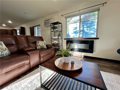 Electric fireplace is included