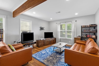 Living area with wood finished floors and recesse