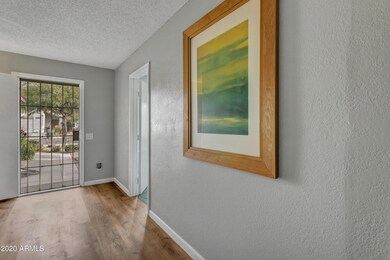 Front Door and entrance to first bedroom